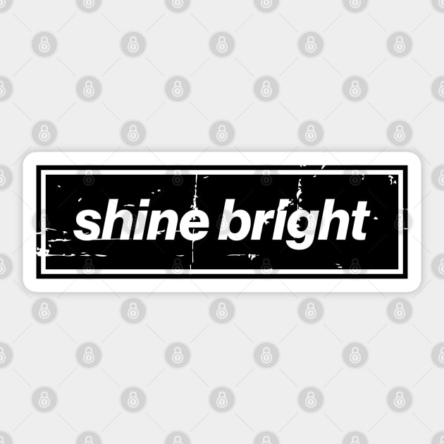 Shine Bright Oasis Distressed Typography – Bold Positive Message Design Black Sticker by Butter Creative